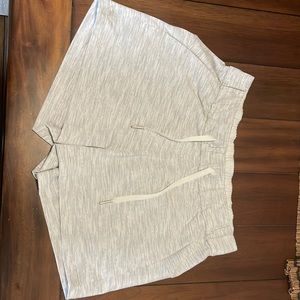 Lululemon on the fly shorts size 4. The tag is removed.